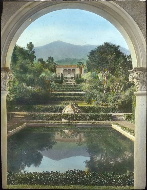 Lantern slide from the Library of Congress Frances Benjamin Johnston Collection: "Las Tejas," Oakleigh Thorne house, 170 Picacho Road, Montecito, California. View from swimming pool pavilion to house.